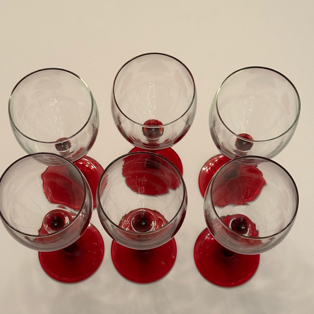 6 Clear Goblets With Red Stems.About 8” Tall.